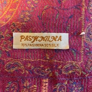 Nice pink pashmina with a couple of small snags. Contains pashmina and silk